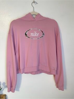 Nike pink cropped hoodie with embroidered flower logo detail size s/m